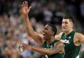 DETROIT - APRIL 04:  Raymar Morgan #2 and Goran Suton #14 of the Michigan State Spartans celebrates after Michigan State won 82-73 against the Connecticut Huskies during the National Semifinal game of the NCAA Division I Men's Basketball Championship at Ford Field on April 4, 2009 in Detroit, Michigan.  (Photo by Gregory Shamus/Getty Images)