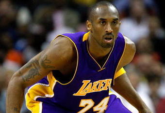 CHARLOTTE, NC - MARCH 31:  Kobe Bryant #24 of the Los Angeles Lakers prepares to play defense against the Charlotte Bobcats during their game at Time Warner Cable Arena on March 31, 2009 in Charlotte, North Carolina.  NOTE TO USER: User expressly acknowledges and agrees that, by downloading and/or using this Photograph, user is consenting to the terms and conditions of the Getty Images License Agreement.  (Photo by Streeter Lecka/Getty Images)
