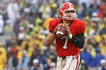 ATHENS, GA - NOVEMBER 29:  Quarterback Matthew Stafford #7 of the Georgia Bulldogs drops back to pass during the game against the Georgia Tech Yellow Jackets during the game at Sanford Stadium on November 29, 2008 in Athens, Georgia.  The Yellow Jackets beat the Bulldogs 45-42.  (Photo by Mike Zarrilli/Getty Images)