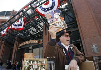 SAN FRANCISCO - APRIL 7: A vendor hawks programs before the opening day game between the San Diego Padres and San Francisco Giants on April 7, 2008 at AT&T Park in San Francisco, California.  (Photo by Greg Trott/Getty Images)