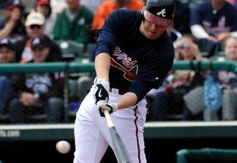 LAKE BUENA VISTA, FL - MARCH 01:  Chipper Jones #10 of the Atlanta Braves hits during a spring training game against the Philadelphia Phillies at Champion Stadium on March 1, 2009 in Lake Buena Vista, Florida.  (Photo by Sam Greenwood/Getty Images)