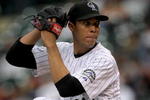 DENVER - MAY 16:  Starting pitcher Ubaldo Jimenez #38 of the Colorado Rockies delivers against the Minnesota Twins during Interleague MLB action at Coors Field on May 16, 2008 in Denver, Colorado. The Twins defeated the Rockies 4-2.  (Photo by Doug Pensinger/Getty Images)