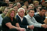 NEW YORK - MARCH 9:  WWE wrestlers (L-R) Triple H, Ric Flair, Randy Orton and Batista sit courtside at the New York Knicks v Boston Celtics  NBA game March 9, 2004 at Madison Square Garden in New York City.   (Photo by Ray Amati/Getty Images)