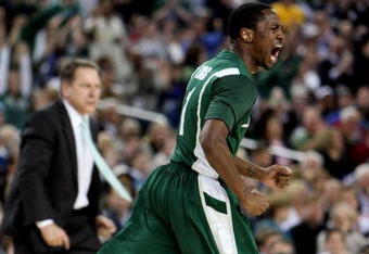 DETROIT - APRIL 04:  Kalin Lucas #1 of the Michigan State Spartans reacts after he made a lay up in the second half against the Connecticut Huskies during the National Semifinal game of the NCAA Division I Men's Basketball Championship at Ford Field on April 4, 2009 in Detroit, Michigan.  (Photo by Gregory Shamus/Getty Images)