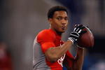 INDIANAPOLIS, IN - FEBRUARY 22:  Quarterback Pat White of West Virginia passes the football during the NFL Scouting Combine presented by Under Armour at Lucas Oil Stadium on February 22, 2009 in Indianapolis, Indiana. (Photo by Scott Boehm/Getty Images)