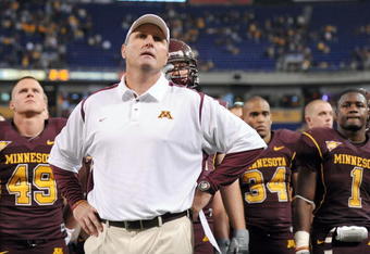 MINNEAPOLIS - NOVEMBER 01:  Head Coach Tim Brewster of the Minnesota Golden Gophers and his players react to a 24-17 loss to the Northwestern Wildcats during the fourth quarter at the Hubert H.Humphrey Metrodome on November 1, 2008 in Minneapolis, Minnesota. (Photo by Harry How/Getty Images)
