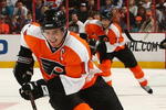 PHILADELPHIA - MARCH 29: Mike Richards #18 of the Philadelphia Flyers skates against the Boston Bruins at the Wachovia Center on March 29, 2009 in Philadelphia, Pennsylvania.  (Photo by Chris McGrath/Getty Images)