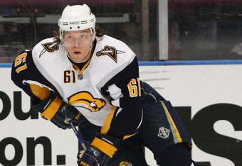 NEW YORK - MARCH 21:  Maxim Afinogenov #61 of the Buffalo Sabres skates against the New York Rangers during the game on March 21, 2009 at Madison Square Garden in New York City.  (Photo by Chris McGrath/Getty Images)
