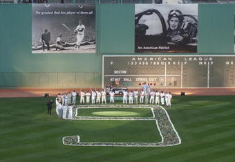 BOSTON - JULY 22:  Former teammates and current Boston Red Sox players stand around a '9' in left field during the Ted Williams tribute on July 22, 2002 at Fenway Park in Boston, Massachusetts. The public was invited to the park to honor Williams who died July 5, 2002.  (Photo by Darren McCollester/Getty Images)  