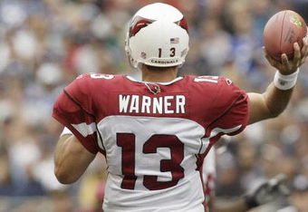 SEATTLE - SEPTEMBER 17:  Backview of quarterback Kurt Warner #13 of the Arizona Cardinals as he passes the ball against the Seattle Seahawks at Qwest Field on September 17, 2006 in Seattle, Washington. The Seahawks won 21-10. (Photo by Otto Greule Jr/Getty Images) 