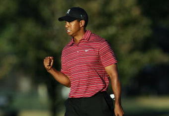 ORLANDO, FL - MARCH 29:  Tiger Woods celebrates a birdie putt on the 15th hole during the final round of the Arnold Palmer Invitational Presented by Mastercard at the Bay Hill Club and Lodge on March 29, 2009 in Orlando, Florida   (Photo by Doug Benc/Getty Images)