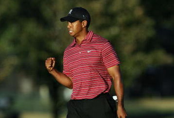 ORLANDO, FL - MARCH 29:  Tiger Woods celebrates a birdie putt on the 15th hole during the final round of the Arnold Palmer Invitational Presented by Mastercard at the Bay Hill Club and Lodge on March 29, 2009 in Orlando, Florida   (Photo by Doug Benc/Getty Images)