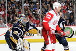 BUFFALO, NY - MARCH 2:  Goaltender Ryan Miller #30 of the Buffalo Sabres tries to get a look at the puck around the screen of Johan Franzen #93 of the Detroit Red Wings during their NHL game on March 2, 2008 at HSBC Arena in Buffalo, New York. The Red Wings defeated the Sabres 4-2. (Photo by Rick Stewart/Getty Images)