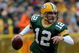 GREEN BAY, WI - NOVEMBER 16:  Quaterback Aaron Rodgers #12 of the Green Bay Packers looks for a receiver against the Chicago Bears during the NFL game at Lambeau Field on November 16, 2008 in Green Bay, Wisconsin.  (Photo by Doug Pensinger/Getty Images)