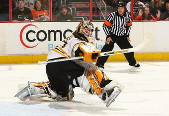 PHILADELPHIA - MARCH 29: Goalkeeper Tim Thomas #30 of the Boston Bruins makes a save against the Philadelphia Flyers at the Wachovia Center on March 29, 2009 in Philadelphia, Pennsylvania.  (Photo by Chris McGrath/Getty Images)