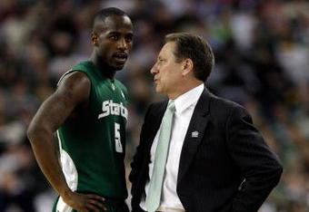 DETROIT - APRIL 04:  Head coach Tom Izzo of the Michigan State Spartans talks with Travis Walton #5 while taking on the Connecticut Huskies during the National Semifinal game of the NCAA Division I Men's Basketball Championship at Ford Field on April 4, 2009 in Detroit, Michigan.  (Photo by Andy Lyons/Getty Images)