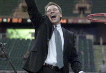 25 Mar 2001: Michigan State head coach Tom Izzo waves to fans after cutting down a net following his team's 69-62 victory over Temple during their NCAA South Region Final game at the Georgia Dome in Atlanta, Georgia.  <DIGITAL IMAGE> Mandatory Credit: Andy Lyons/ALLSPORT