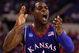 INDIANAPOLIS - MARCH 27:  Sherron Collins #4 of the Kansas Jayhawks reacts in the first half against the Michigan State Spartans during the third round of the NCAA Division I Men's Basketball Tournament at the Lucas Oil Stadium on March 27, 2009 in Indianapolis, Indiana.  (Photo by Andy Lyons/Getty Images)