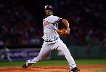 BOSTON - OCTOBER 13:  Starting pitcher Fausto Carmona #55 of the Cleveland Indians pitches of the Boston Red Sox during Game Two of the American League Championship Series at Fenway Park on October 13, 2007 in Boston, Massachusetts.  (Photo by Elsa/Getty Images)