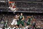 DETROIT - APRIL 04:  Stanley Robinson #21 of the Connecticut Huskies dunks against Goran Suton #14 of the Michigan State Spartans during the National Semifinal game of the NCAA Division I Men's Basketball Championship at Ford Field on April 4, 2009 in Detroit, Michigan. Michigan State won 82-73. (Photo by Andy Lyons/Getty Images)