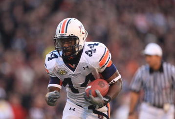 ATHENS - NOVEMBER 10:  Ben Tate #44 of the Auburn Tigers carries the ball during the NFL game against the Georgia Bulldogs at Sanford Stadium on November 10, 2007 in Athens, Georgia. (Photo by Streeter Lecka/Getty Images)