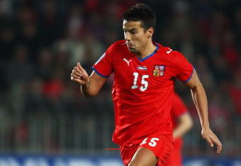 PRAGUE, CZECH REPUBLIC - APRIL 01:  Milan Baros of Czech Republic runs with the ball during the FIFA 2010 World Cup qualifier between Czech Republic and Slovakia at the Axa Arena on April 1, 2009  in Prague, Czech Republic.  (Photo by Jamie McDonald/Getty Images)