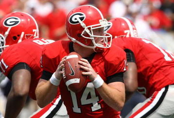 ATHENS, GA - AUGUST 30:  Quarterback Joe Cox #14 of the Georgia Bulldogs takes a snap and looks to hand the ball off during the game against the Georgia Southern Eagles at Sanford Stadium on August 30, 2008 in Athens, Georgia.  The Bulldogs defeated the Eagles 45-21.  (Photo by Mike Zarrilli/Getty Images)