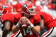 ATHENS, GA - AUGUST 30: Quarterback Joe Cox #14 of the Georgia Bulldogs takes a snap and looks to hand the ball off during the game against the Georgia Southern Eagles at Sanford Stadium on August 30, 2008 in Athens, Georgia. The Bulldogs defeated the Eagles 45-21. (Photo by Mike Zarrilli/Getty Images)