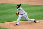 BALTIMORE - APRIL 06:  C.C. Sabathia #52 of the New York Yankees pitches against the Baltimore Orioles during opening day on April 6, 2009 at Camden Yards in Baltimore, Maryland.  (Photo by Greg Fiume/Getty Images)