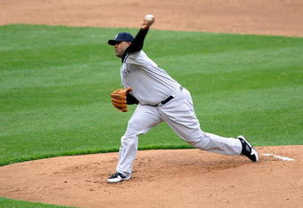 BALTIMORE - APRIL 06:  C.C. Sabathia #52 of the New York Yankees pitches against the Baltimore Orioles during opening day on April 6, 2009 at Camden Yards in Baltimore, Maryland.  (Photo by Greg Fiume/Getty Images)