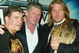 NEW YORK - MARCH 11: (L-R) Wrestler Eddie Guerrero, WWE Chairman Vince McMahon and Wrestler Triple H attend a press conference to promote Wrestlemania XX at Planet Hollywood March 11, 2004 in New York City. (Photo by Peter Kramer/Getty Images)