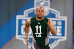 INDIANAPOLIS, IN - FEBRUARY 23:  Linebacker Marcus Freeman of Ohio State runs the 40 yard dash during the NFL Scouting Combine presented by Under Armour at Lucas Oil Stadium on February 23, 2009 in Indianapolis, Indiana. (Photo by Scott Boehm/Getty Images)