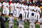 SAN DIEGO - APRIL 6:    The Los Angeles Dodgers and the San Diego Padres stand on the baselines during openng day pregame ceremonies on April 6, 2009 at Petco Park in San Diego, California.   (Photo by Stephen Dunn/Getty Images)