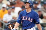 SURPRISE, AZ - MARCH 05:  Taylor Teagarden #2 of the Texas Rangers reacts after striking out during the spring training game against the San Diego Padres at Surprise Stadium on March 5, 2009 in Surprise, Arizona. The Rangers defeated the Padres 4-3.  (Photo by Christian Petersen/Getty Images)
