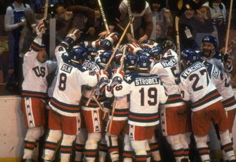 Feb 1980:  The USA Team celebrate their win against Russia after the final in the Ice Hockey event at the 1980 Winter Olympic Games in Lake Placid, USA. The USA won the gold medal and Russia the silver medal in this event.. \ Mandatory Credit: Steve  Powell/Allsport