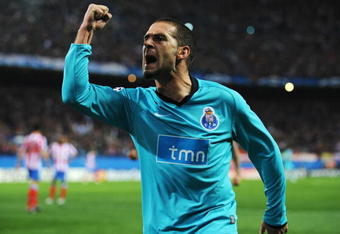 MADRID, SPAIN - FEBRUARY 24:  Lisandro Lopez of FC Porto celebrates as he scores their first goal during the Champions League  Round of 16, First Leg match between Atletico Madrid and FC Porto at the Vicente Calderon on February 24, 2009 in Madrid, Spain.  (Photo by Jasper Juinen/Getty Images)