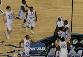 DETROIT - APRIL 06:  Tyler Hansbrough #50 of the North Carolina Tar Heels celebrates with his teammates as the Michigan State Spartans leave the court after losing to the Tar Heels 89-72 during the 2009 NCAA Division I Men's Basketball National Championship game at Ford Field on April 6, 2009 in Detroit, Michigan.  (Photo by Streeter Lecka/Getty Images)