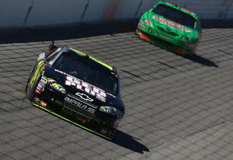 FORT WORTH, TX - APRIL 05:  Jeff Gordon, driver of the #24 DuPont Chevrolet, leads Kyle Busch, driver of the #18 Interstate Batteries Toyota, during the NASCAR Sprint Cup Series Samsung 500 at Texas Motor Speedway on April 5, 2009 in Fort Worth, Texas.  (Photo by Jonathan Ferrey/Getty Images)
