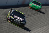 FORT WORTH, TX - APRIL 05:  Jeff Gordon, driver of the #24 DuPont Chevrolet, leads Kyle Busch, driver of the #18 Interstate Batteries Toyota, during the NASCAR Sprint Cup Series Samsung 500 at Texas Motor Speedway on April 5, 2009 in Fort Worth, Texas.  (Photo by Jonathan Ferrey/Getty Images)
