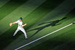 ANAHEIM, CA - APRIL 06:  Mark Ellis #14 of the Oakland Athletics throws the ball during pre game warm up against Los Angeles Angels of Anaheim on opening day at the Angel Stadium of Anaheim on April 6, 2009 in Anaheim, California.  (Photo by Kevork Djansezian/Getty Images)
