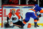 UNIONDALE, NY - MARCH 28: Frans Nielsen #51 of the New York Islanders scores a backhand goal against Martin Biron #51 of the Philadelphia Flyers during the shootout of their National Hockey League game on March 28, 2009 at Nassau Coliseum in Uniondale, New York.  (Photo by Paul Bereswill/Getty Images)