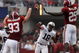 TUSCALOOSA, AL - NOVEMBER 29:  Quarterback Kodi Burns #18 of the Auburn Tigers has a pass tipped by defensive lineman Bobby Greenwood #93 and linebacker Rolando McClain #25 of the Alabama Crimson Tide at Bryant-Denny Stadium on November 29, 2008 in Tuscaloosa, Alabama.  (Photo by Doug Benc/Getty Images)