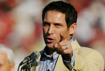 SAN FRANCISCO - NOVEMBER 20:  Steve Young speaks to the crowd as the 49ers celebrate his induction into the Hall of Fame at halftime during the NFL game between the San Francisco 49ers and the Seattle Seahawks on November 20, 2005 at Monster Park in San Francisco, California.  (Photo by Jed Jacobsohn/Getty Images)