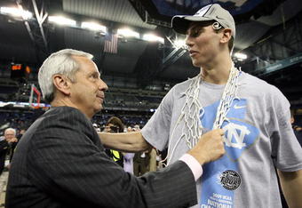 DETROIT - APRIL 06:  (L-R) Head coach Roy Williams and Tyler Hansbrough #50 of the North Carolina Tar Heels celebrate after they won 89-72 against the Michigan State Spartans during the 2009 NCAA Division I Men's Basketball National Championship game at Ford Field on April 6, 2009 in Detroit, Michigan.  (Photo by Andy Lyons/Getty Images)