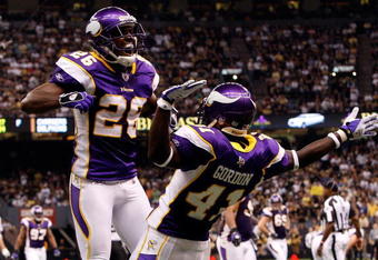 NEW ORLEANS - OCTOBER 06:  Antoine Winfield #26 and Charles Gordon #41 of the Minnesota Vikings celebrate after breaking up a touchdown pass against the New Orleans Saints on October 6, 2008 at the Superdome in New Orleans, Louisiana.  (Photo by Chris Graythen/Getty Images)