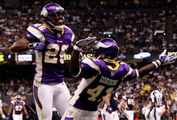 NEW ORLEANS - OCTOBER 06:  Antoine Winfield #26 and Charles Gordon #41 of the Minnesota Vikings celebrate after breaking up a touchdown pass against the New Orleans Saints on October 6, 2008 at the Superdome in New Orleans, Louisiana.  (Photo by Chris Graythen/Getty Images)