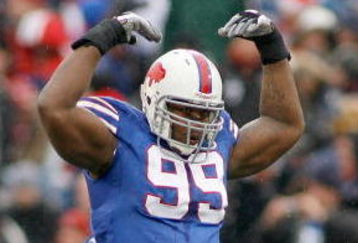 ORCHARD PARK, NY - NOVEMBER 30: Marcus Stroud #99 of the Buffalo Bills encourages the crowd against the San Francisco 49ers  on November 30, 2008 at Ralph Wilson Stadium in Orchard Park, New York. The 49ers won 10-3. (Photo by Rick Stewart/Getty Images)