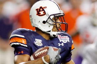 ATLANTA - DECEMBER 31:  Robert Dunn of the Auburn University Tigers returns a kick during the Chick-Fil-A Bowl on December 31, 2007 at the Georgia Dome in Atlanta, Georgia.  (Photo by Chris Graythen/Getty Images)