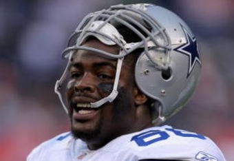 DENVER - AUGUST 16:  Nose tackle Tank Johnson #66 of the Dallas Cowboys warms up prior to facing the Denver Broncos during preseason NFL action at Invesco Field at Mile High on August 16, 2008 in Denver, Colorado. The Broncos defeated the Cowboys 23-13.  (Photo by Doug Pensinger/Getty Images)