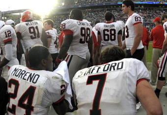 ORLANDO, FL - JANUARY 1: Quarterback Matthew Stafford #7 and running back Knowshon Moreno #24 of the University of Georgia watch from the bench during the final minutes of play against the Michigan State Spartans at the 2009 Capital One Bowl at the Citrus Bowl on January 1, 2009 in Orlando, Florida.  (Photo by Al Messerschmidt/Getty Images) 